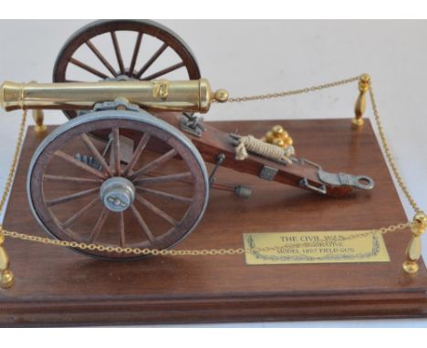 Well presented scale model of an American Civil War 1857 field gun. The model is of metal and plastic construction on a wood 