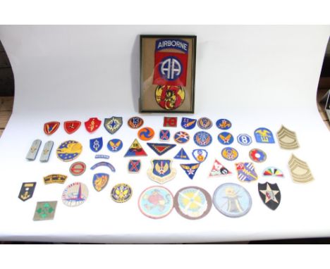 Collection of US military regimental and squadron cloth badges and patches, mainly WW2 era including 513th parachute infantry