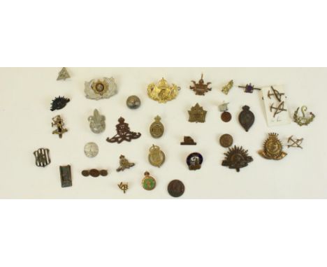 Collection of British military and other badges, emblems etc. highlights Womens Land Army, Royal Arsenal Woolwich, Carnarvons