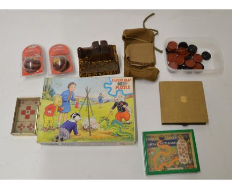 Vintage games, puzzles and oddments including an "Alice In Puzzleland" ball bearing tilt game, a fold out draughts table with