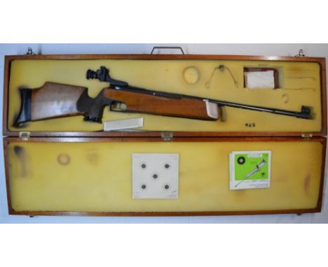 Cased Feinwerkbau Model 300S .177 side lever action sporting air rifle in good working order with instruction manual, attacha