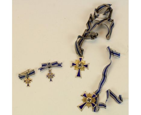 Pair of German Third Reich enamel Mothers crosses on blue and white ribbons with associated miniatures 