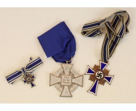 German Third Reich enamel mothers cross medal and associated miniature and a Civil Service Faithful Service medal 