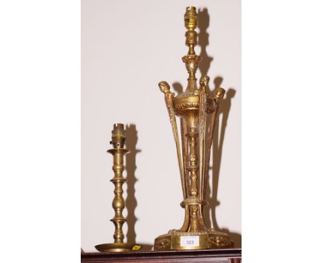 A brass table lamp of Louis XVI design, on shaped base, 22" high, and a smaller brass lamp, 11 1/2" high