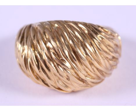 An 18ct gold dress ring with textured finish, by Kutchinsky, size R, 14.4g