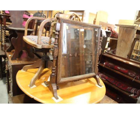A stained beech framed dressing mirror, on turned supports, 27" wide