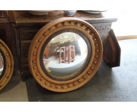 A 19th century plate convex gilt ball decorated wall mirror, 15" dia