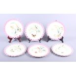 A set of six butterfly decorated ribbon edge plates, 7 1/2" dia
