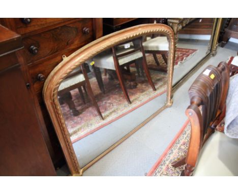 A 19th century arch top over mantel mirror, plate 38" x 28", in gilt frame