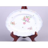 A Continental majolica oval plate with floral decoration, 9" wide (restored)