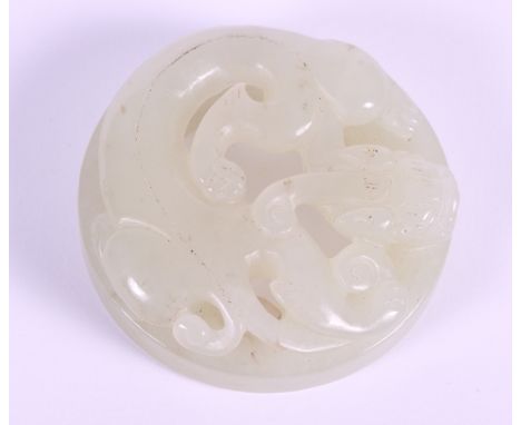 A Chinese carved celadon jade roundel decorated Kylin, 2" dia