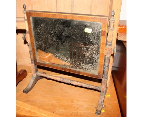 A 19th century mahogany framed toilet mirror with brass urn finials, 17" wide, and a similar smaller toilet mirror, on turned