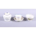 An early 19th century Staffordshire sugar and cover, 3 1/2" dia, a similar tea bowl, and a tea