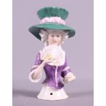 An early 20th century Continental porcelain half doll, 5 1/2" high