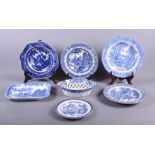 An early 19th century blue and white transfer decorated chestnut basket, a similar osier plate, four