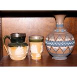 A Royal Doulton stoneware silver mounted jug, 5 1/2" high, a similar beaker and a piece of Slaters