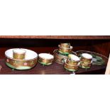 A Minton bone china gilt and waterlily decorated part teaset attributed to Christopher Dresser
