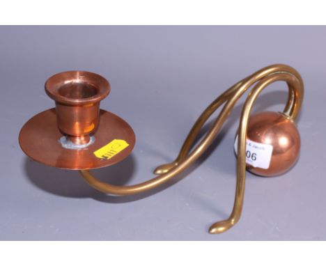 A brass and copper counterbalance candlestick, in the style of W A S Benson