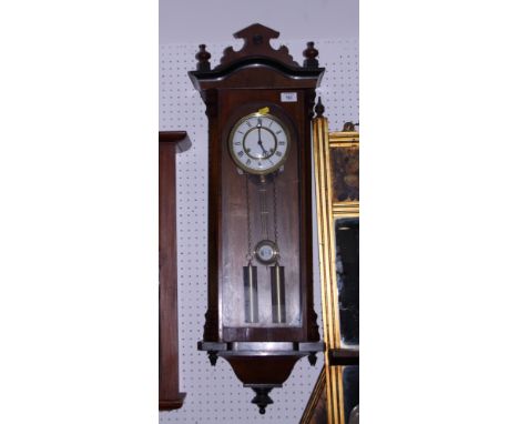 A Vienna style wall clock with white enamel dial, 36" high