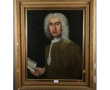 An early 18th century oil on canvas, portrait of a gentleman with a letter, 19 1/2" x 24 1/2", in gilt frame (cleaned and rel