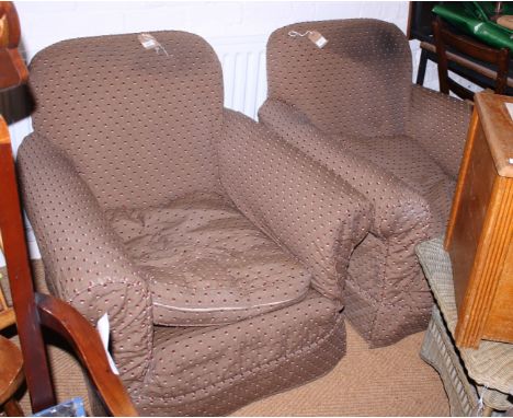 A pair of deep seat arm easy chairs with light brown loose covers