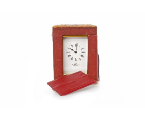 CARRIAGE CLOCK BY R. TAYLOR OF BROMLEYthe white enamel dial with Roman numerals, brass and bevelled five glass gorge case, 14