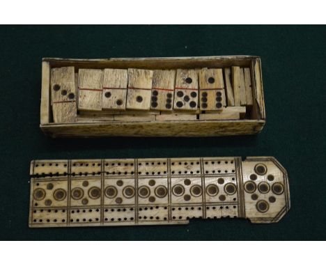 A prisoner of war bone box of dominoes.
