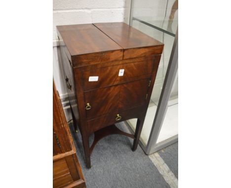 A George III mahogany washstand with bi-fold top, converted to a drinks cabinet.