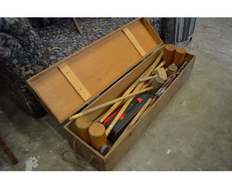 Boxed croquet set.