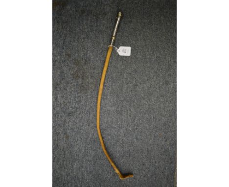An Arabian niello handled camel whip.