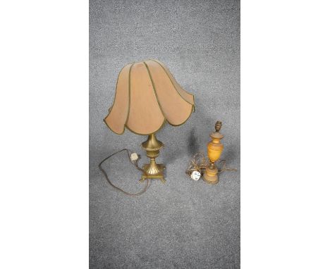 An antique marble and gilt metal table along with a brass twin handled table lamp on four lion paw feet. H.66 