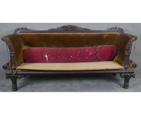 An Irish Regency sofa with carved mahogany frame, in need of reupholstery. H.97 W.210 D.70cm 