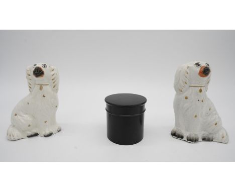 A fair of Staffordshire ceramic dogs and an ebony Victorian screw lidded pot. H.13.7 W.10 