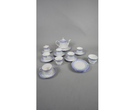 A Langdale Elizabethan tea set, viz: six cups and saucers, six side plates, milk jug, sugar bowl and teapot. H.20 W.23 