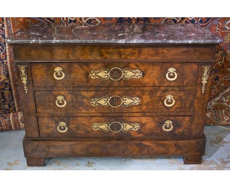 COMMODE, Charles X flame mahogany and gilt metal mounted with marble top above four long drawers,130cm W x 56cm D x 92cm H.