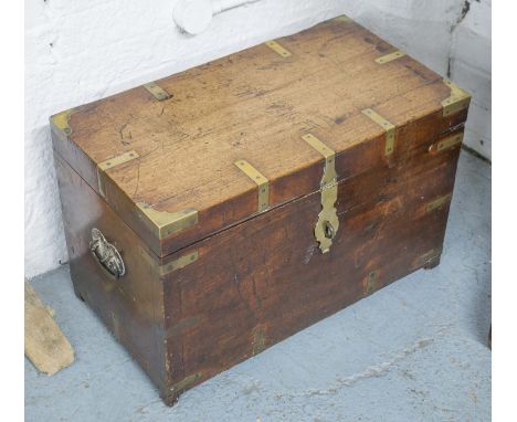 TRUNK, 19th century teak and brass bound of small proportions with hinged top and iron handles, 40cm H x 63cm x 34cm.