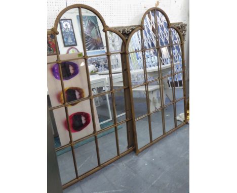 ARCHITECTURAL MIRRORS, a pair, in a metal frame, 148cm x 92cm. (2)