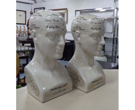 PHRENOLOGY HEADS, a pair, in a ceramic off white glaze, 44cm H. (2)