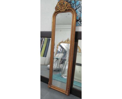 PIER MIRROR, Louis XV style, bevelled in a gilded frame, 217cm x 63cm.