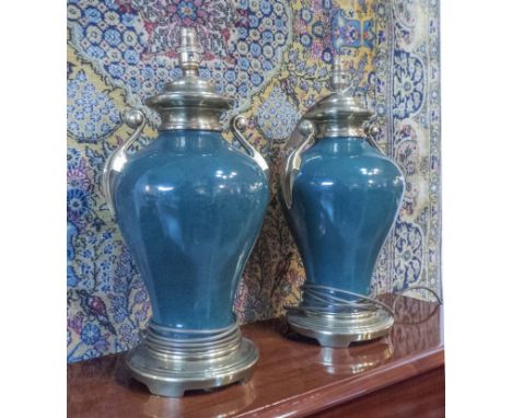 LAMPS, a pair, dark green ceramic and gilt metal mounted with shades, 80cm H. (2)