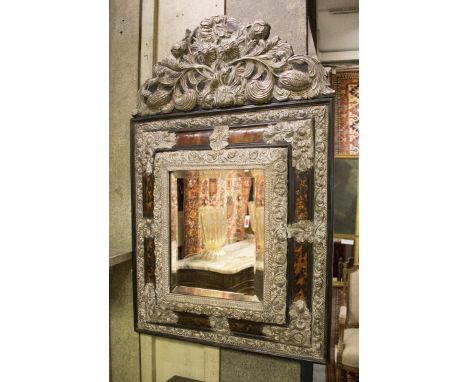 WALL MIRROR, 19th century Dutch, repoussé silvered metal, with bevelled mirror and cushioned faux tortoiseshell panels, 92cm 