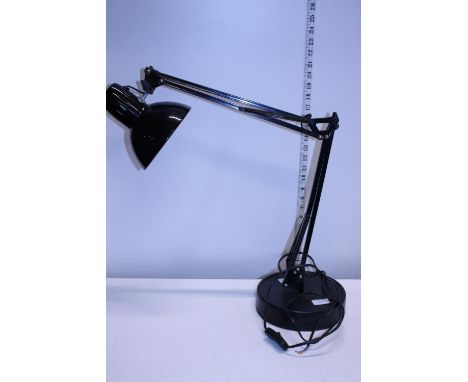 A Hobbyists adjustable desk lamp.  Shipping unavailable 