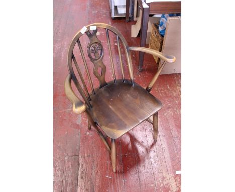 A Ercol carver dining chair, shipping unavailable 