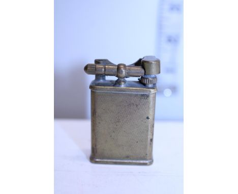 A vintage Casanova brass lighter 