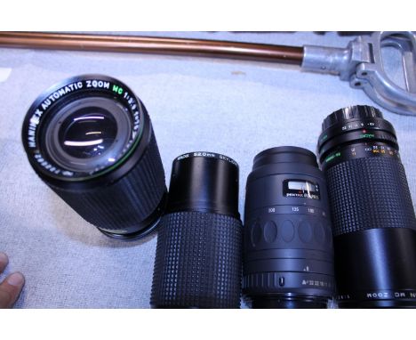 Four assorted 35mm camera lenses including Pentax 