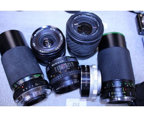 A selection of assorted 35mm camera lenses 