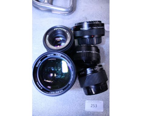 A selection of assorted 35mm camera lenses 