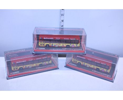 Three collectable Corgi McDonald's buses 