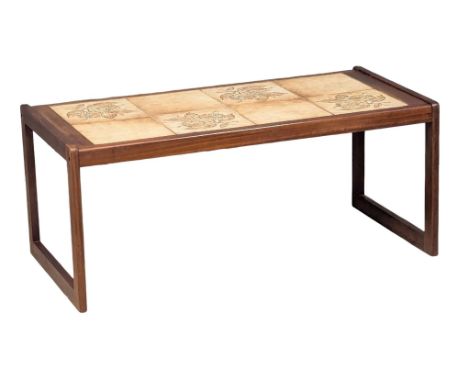 A Mid Century teak coffee table with tile top. 94x47x40cm(6)