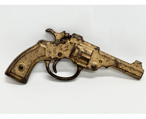 A vintage Bronco toy gun. 19cm